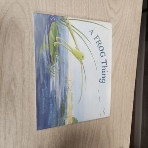 A Frog Thing Book by Eric Drachman - Green and Blue Cover